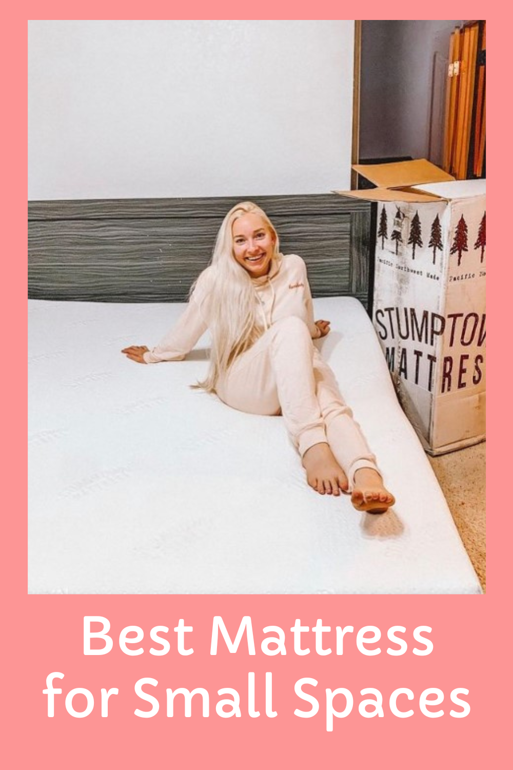 Happy customer sits on the best mattress for a condo or apartment 